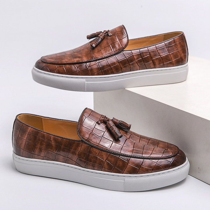 EMBOSSED LEATHER SLIP-ONS